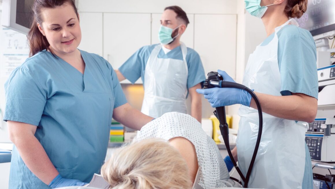 Doctor and nurses with patient